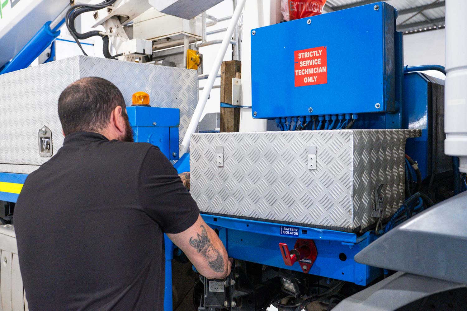 regular maintenance on a cherry picker